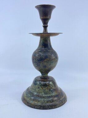 vintage patinated brass candlestick holder with tapered design rustic finish